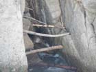 stuff wedged in between rocks under old dardanelle bridge